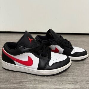 Nike Air Jordan 1 Low Black and White Sneakers with Red Swoosh